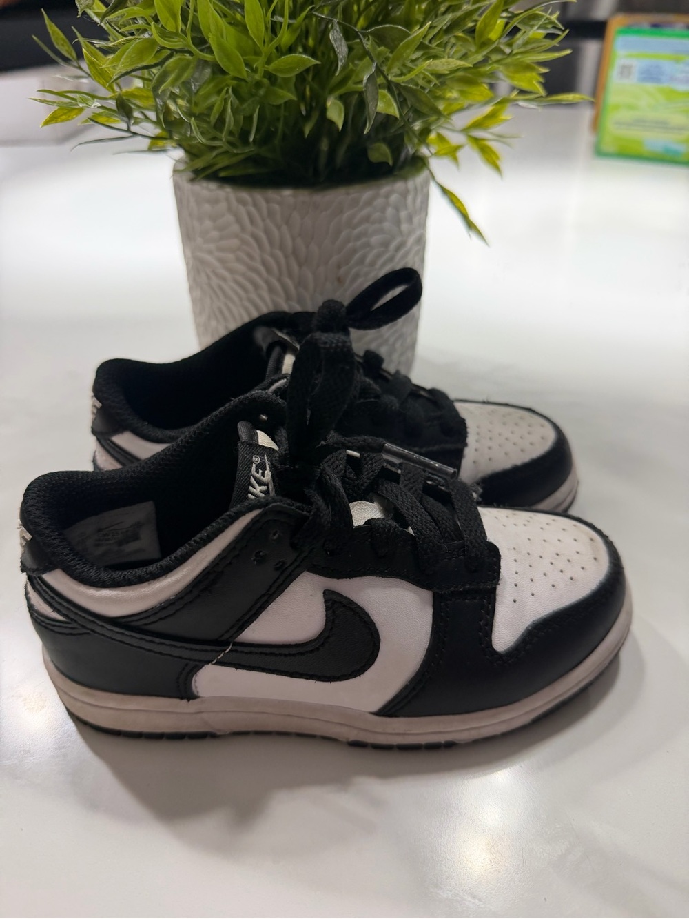 Nike Kids Black and White Low-Top Sneakers with Swoosh
